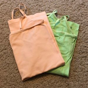 1  bright green cami and 1 peach colored cami